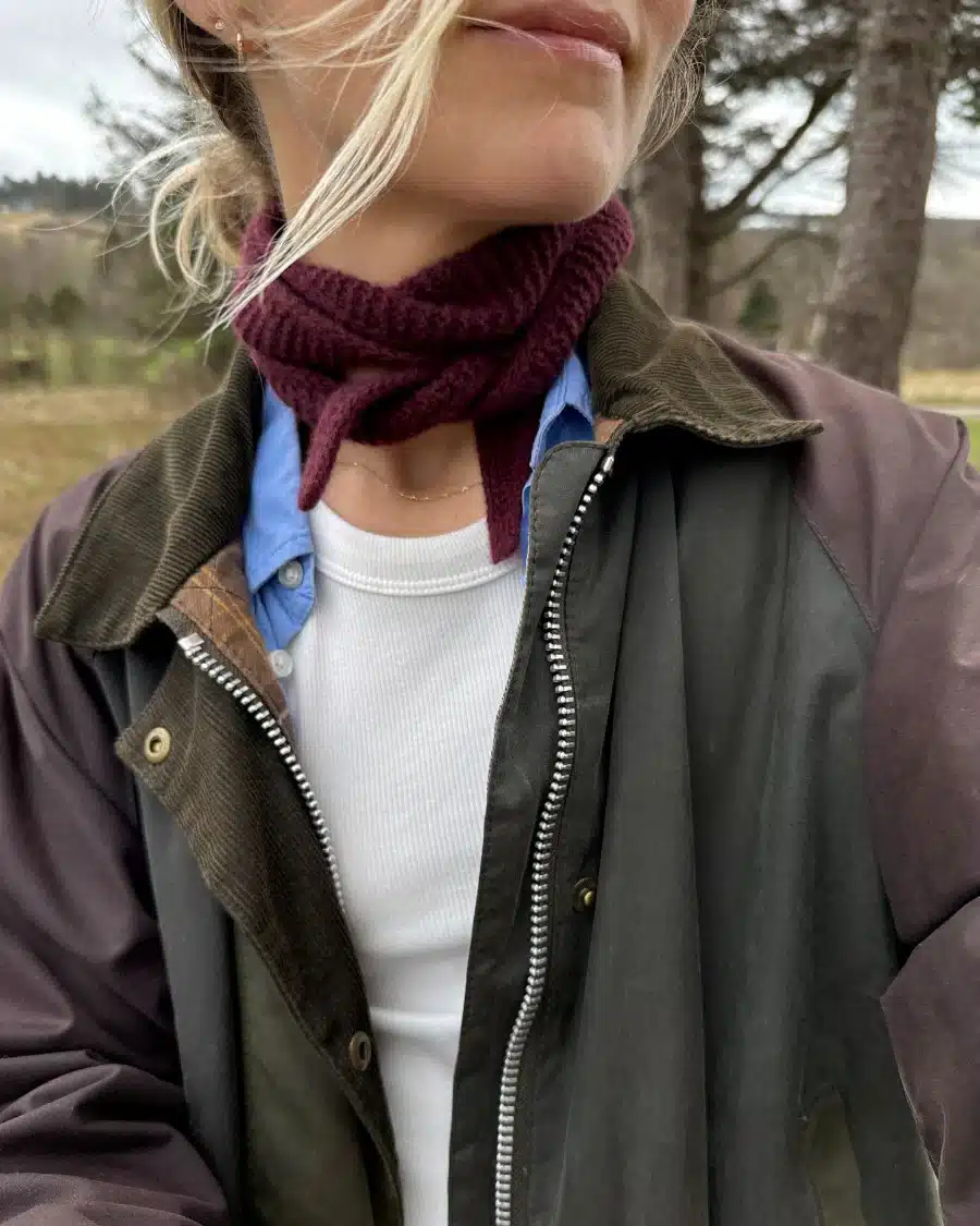 Woman wearing burgundy red scarf sophie scarf